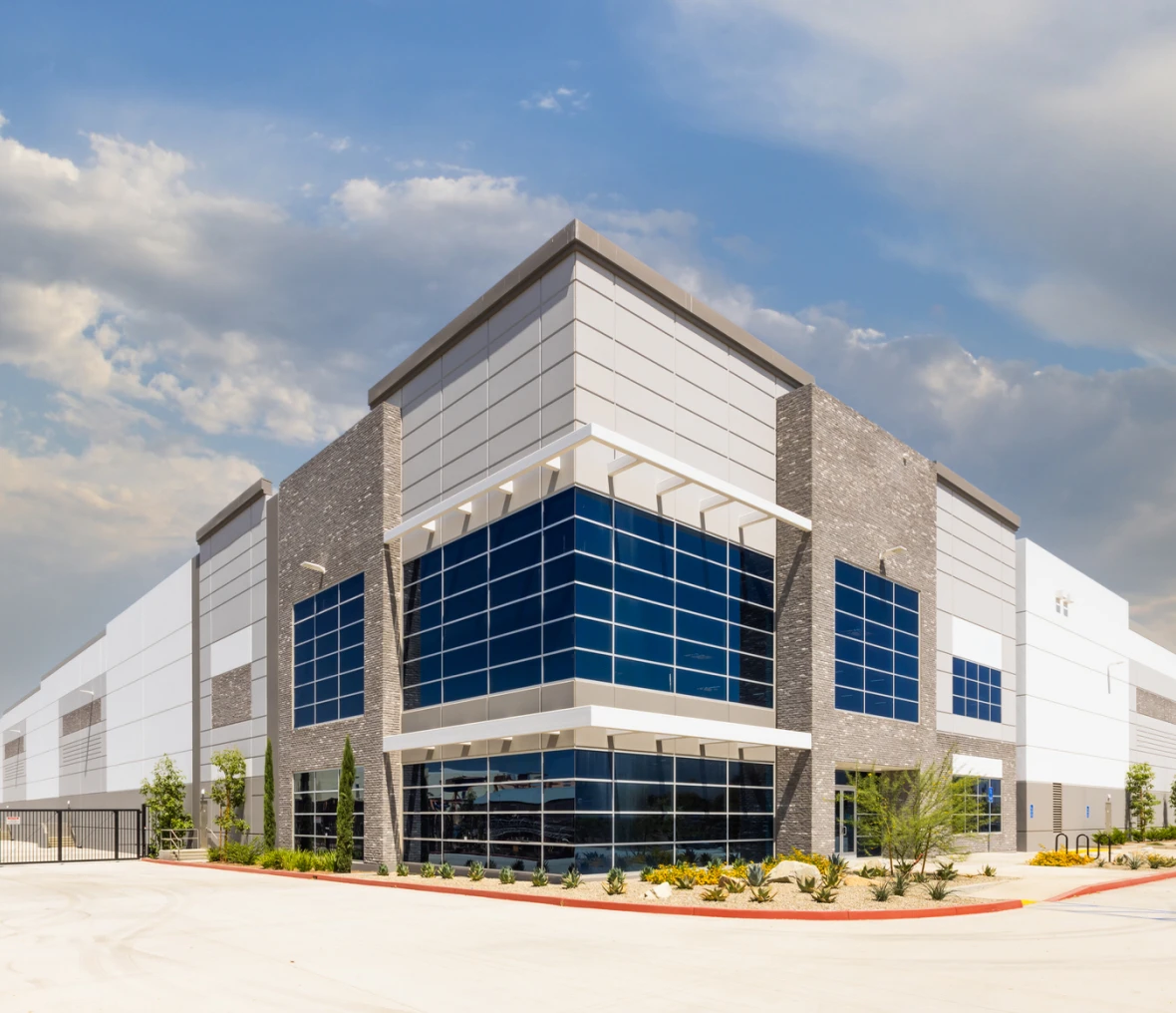Modern industrial building with glass windows.
